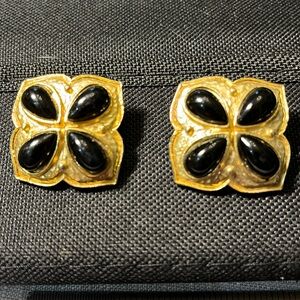 Vintage gold tone and black enameled clip on earrings